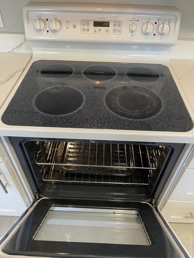 room details featuring electric range oven