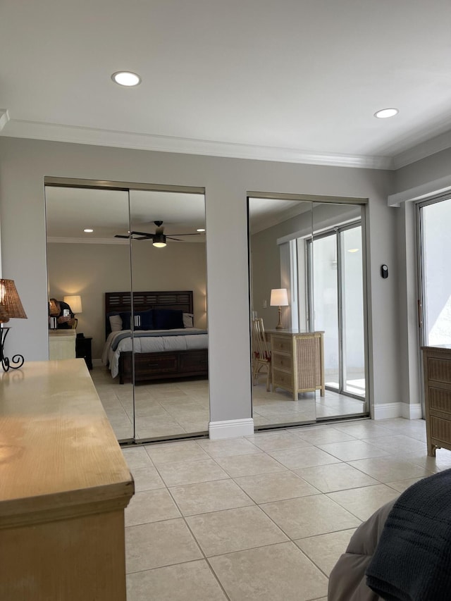 bedroom with crown molding, access to outside, multiple closets, recessed lighting, and light tile patterned floors