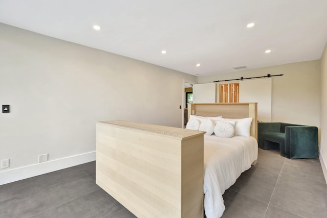 bedroom with a barn door