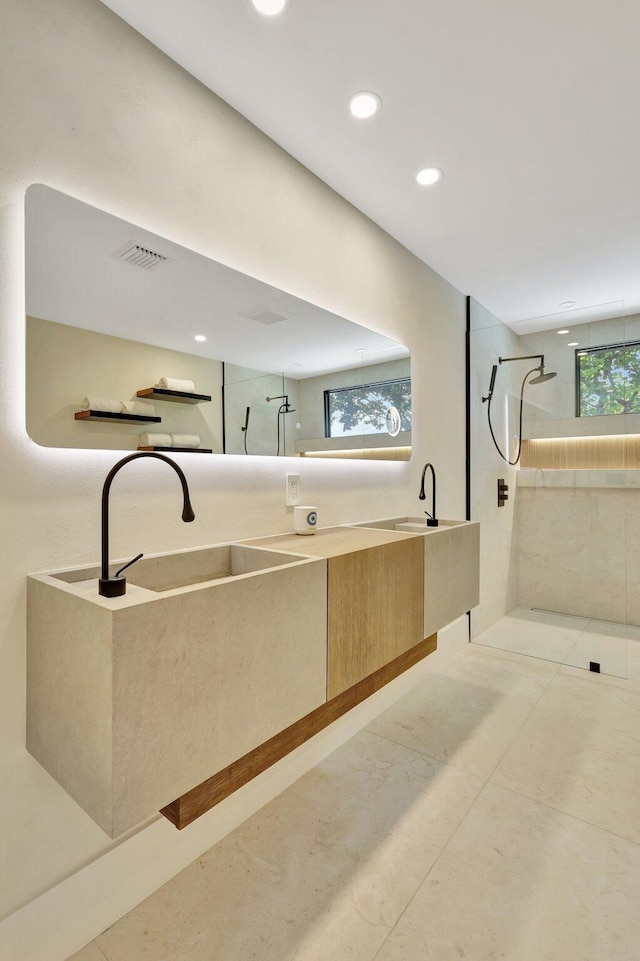 11880 Pebblewood Dr, Wellington, FL 33414 - bathroom with a walk in shower, recessed lighting, and double vanity