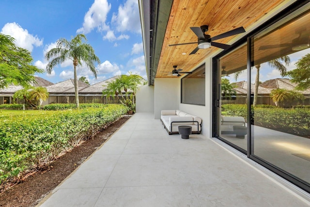 view of patio with ceiling fan and an outdoor hangout area