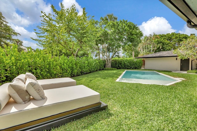 view of yard with a fenced in pool