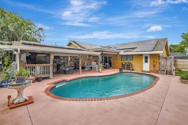 view of pool featuring a patio