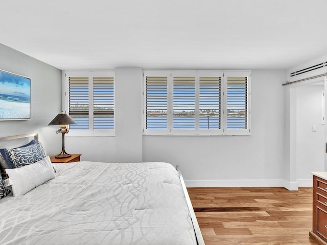 bedroom featuring light wood-type flooring