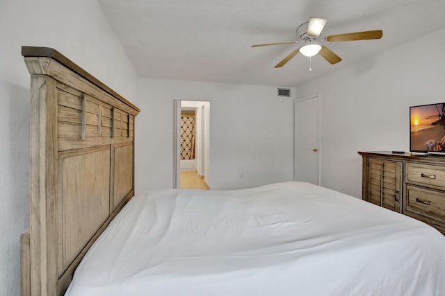 bedroom featuring ceiling fan