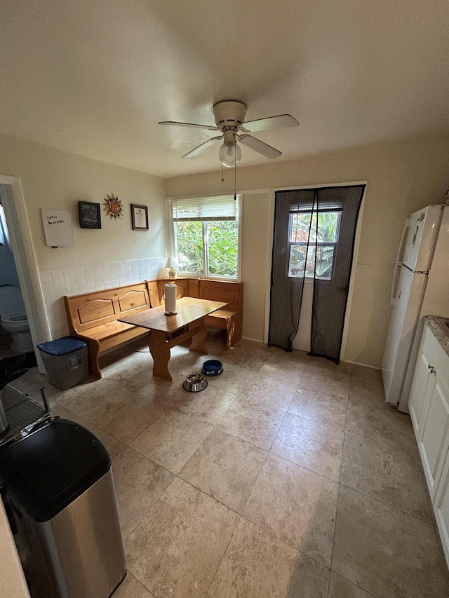 living room featuring ceiling fan