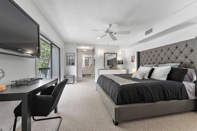 411 4th Ter, Palm Beach Gardens, FL 33418 - bedroom with light colored carpet, a textured ceiling, ensuite bathroom, and a ceiling fan