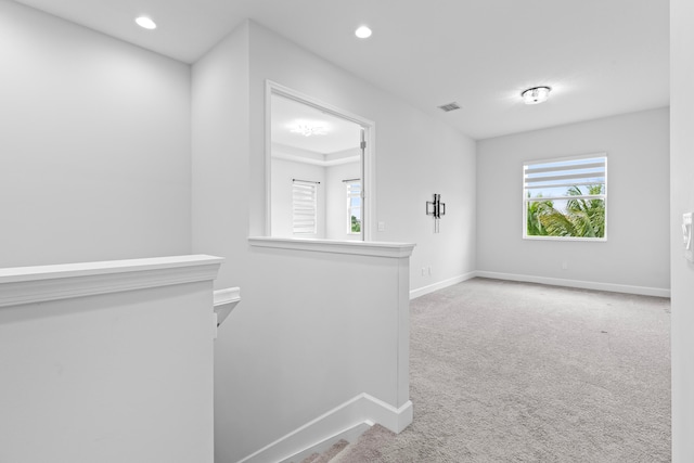 empty room featuring carpet flooring