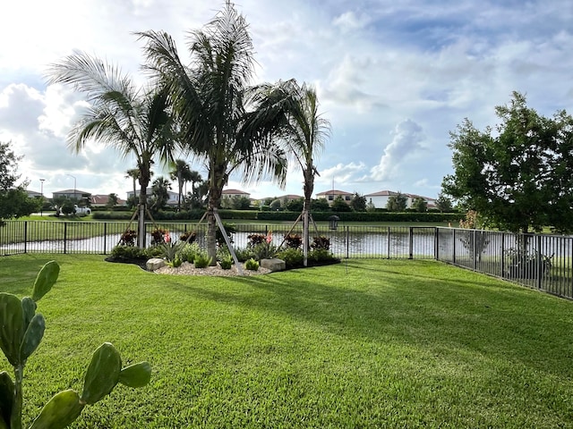 view of yard with a water view