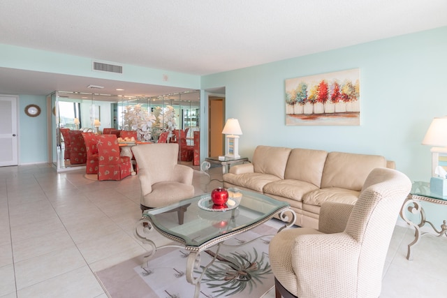 living room with light tile patterned floors