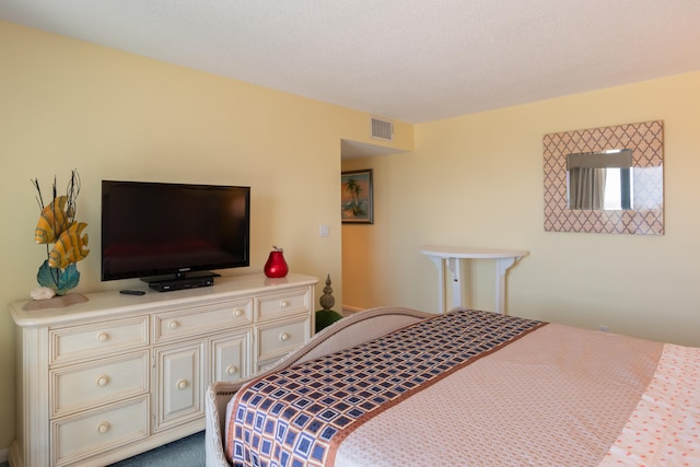 bedroom featuring carpet