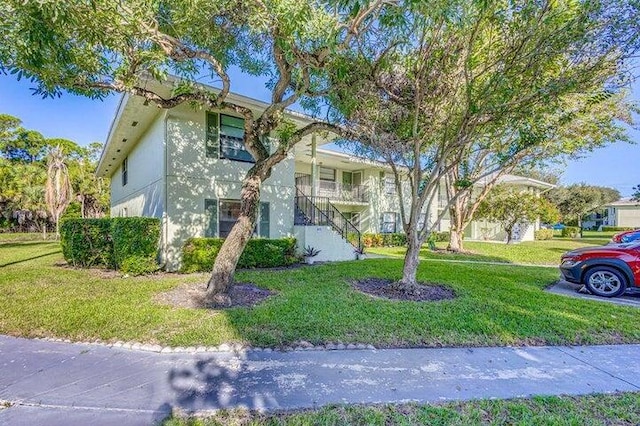 view of front of house with a front yard