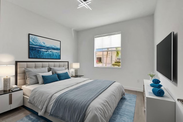 bedroom featuring hardwood / wood-style flooring