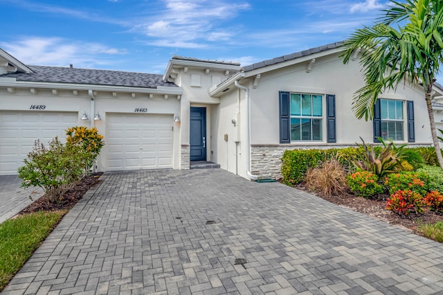 view of front of property featuring a garage