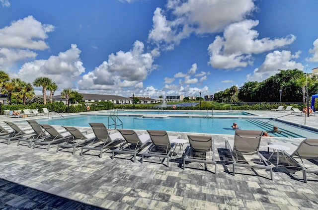 view of pool featuring a patio