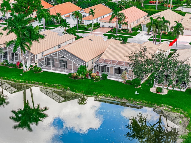 drone / aerial view with a water view