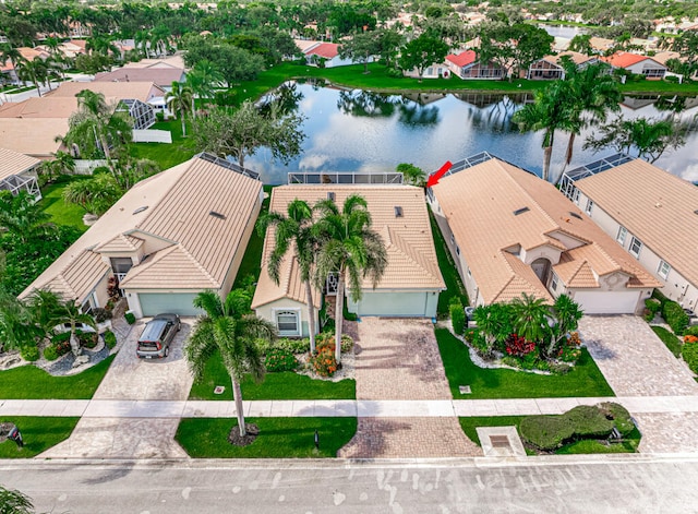 birds eye view of property featuring a water view