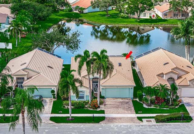 birds eye view of property featuring a water view