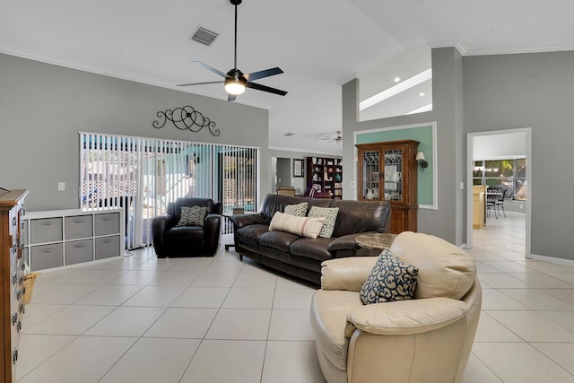 living room with lofted ceiling, light tile patterned floors, crown molding, and ceiling fan