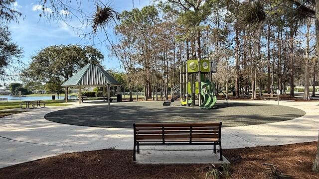 surrounding community with a gazebo and a playground