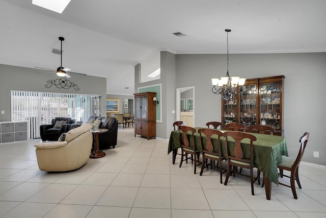 dining room featuring light tile patterned floors, ceiling fan with notable chandelier, ornamental molding, and high vaulted ceiling