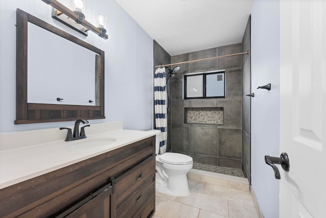 bathroom with vanity, tile patterned flooring, toilet, and a shower with shower curtain