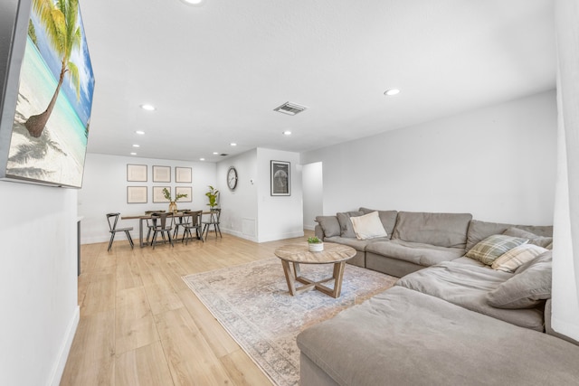 living room featuring light wood-type flooring