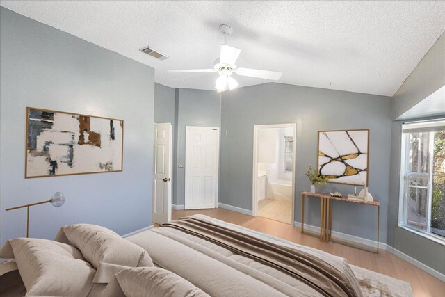 tiled living room featuring high vaulted ceiling, a textured ceiling, and ceiling fan