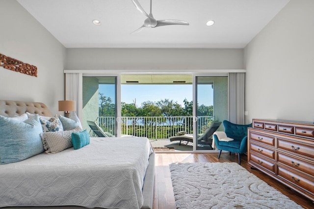 bedroom with ceiling fan, wood-type flooring, and access to exterior