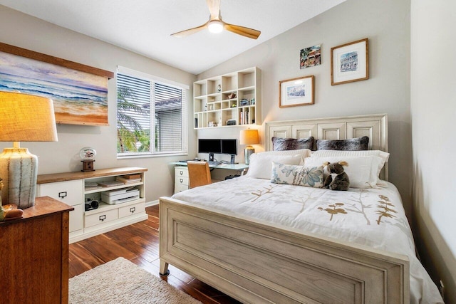 bedroom with dark wood-type flooring, ceiling fan, and lofted ceiling