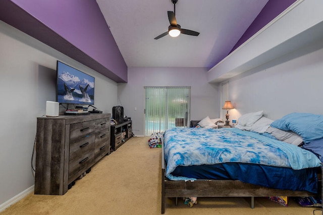 bedroom featuring lofted ceiling, ceiling fan, and light colored carpet