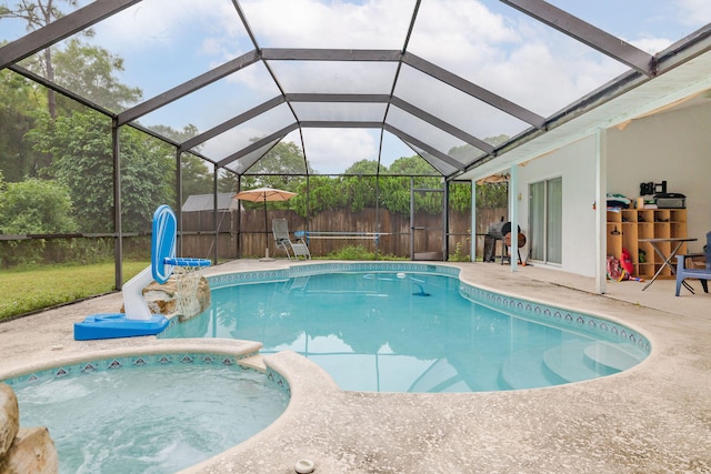 view of pool featuring a patio and a lanai