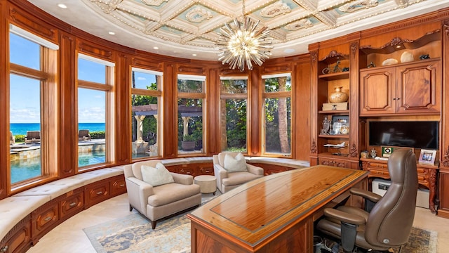 office featuring coffered ceiling, a water view, crown molding, light tile patterned flooring, and a chandelier