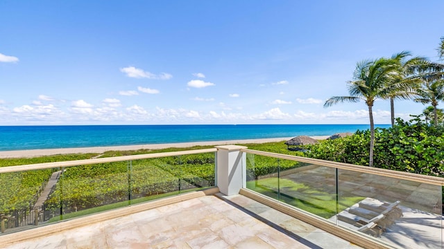 view of water feature with a beach view