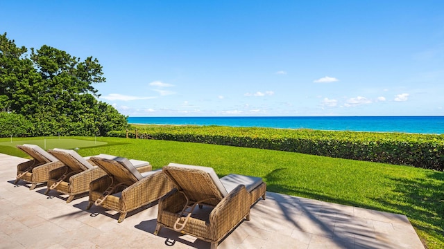 view of patio / terrace with a water view