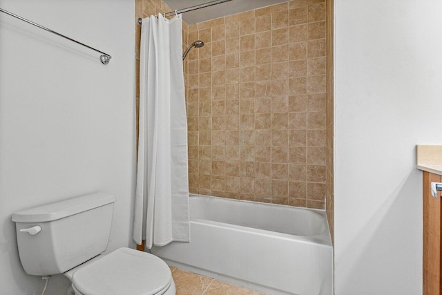 full bathroom featuring tile patterned floors, vanity, toilet, and shower / bathtub combination with curtain