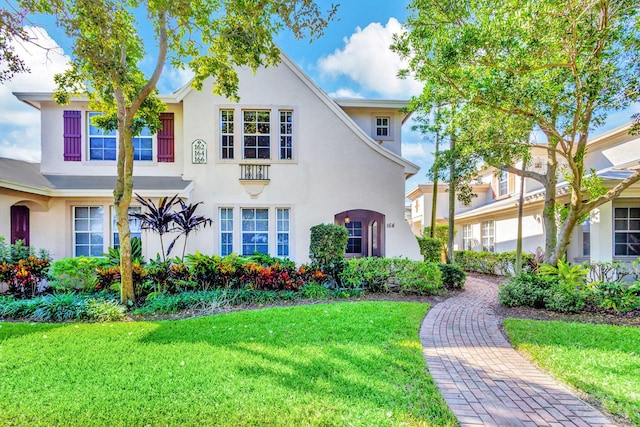 view of front of house with a front lawn