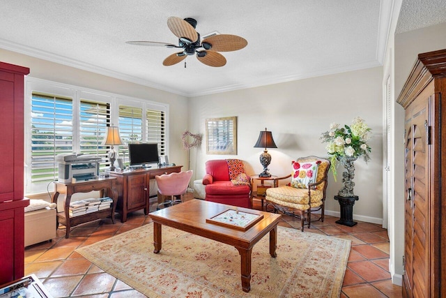 living area featuring a ceiling fan, a textured ceiling, ornamental molding, and light tile patterned floors