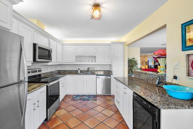 kitchen featuring open shelves, wine cooler, white cabinetry, a textured ceiling, and stainless steel appliances