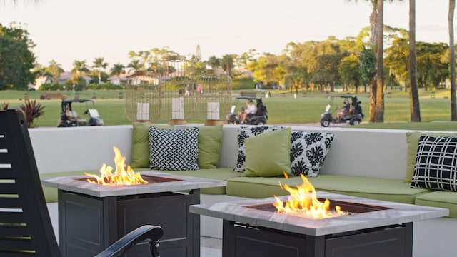 view of patio with a fire pit