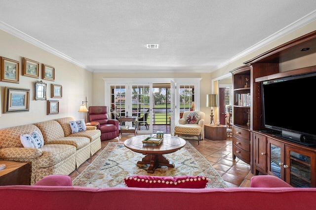 living area with crown molding, tile patterned floors, a textured ceiling, and visible vents