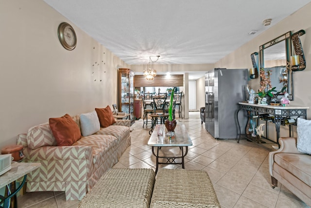 tiled living room with a chandelier