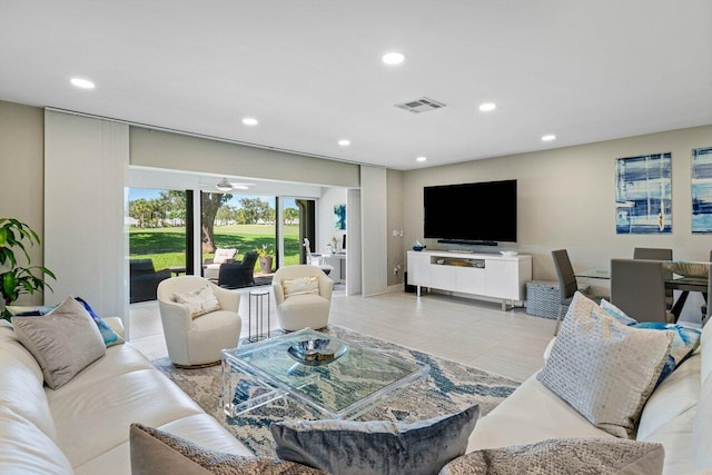 living room featuring ceiling fan