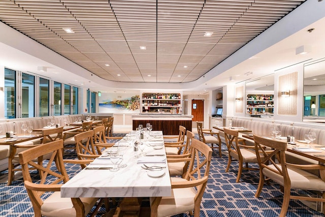 dining area featuring carpet flooring