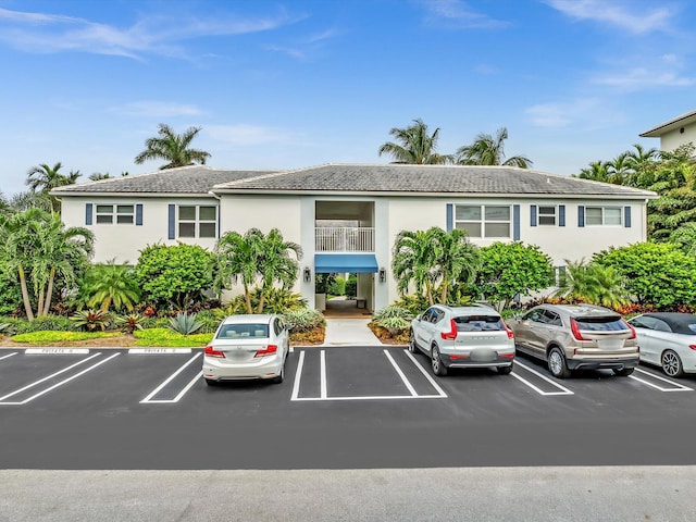1015 Ingraham Ave Unit 6, Delray Beach, FL 33483 - view of building exterior featuring uncovered parking