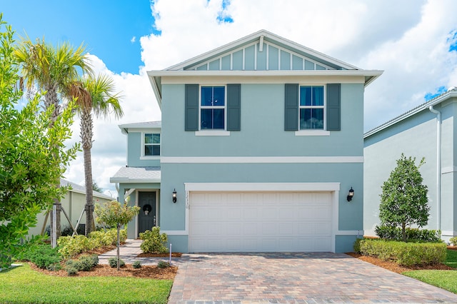 front of property with a garage