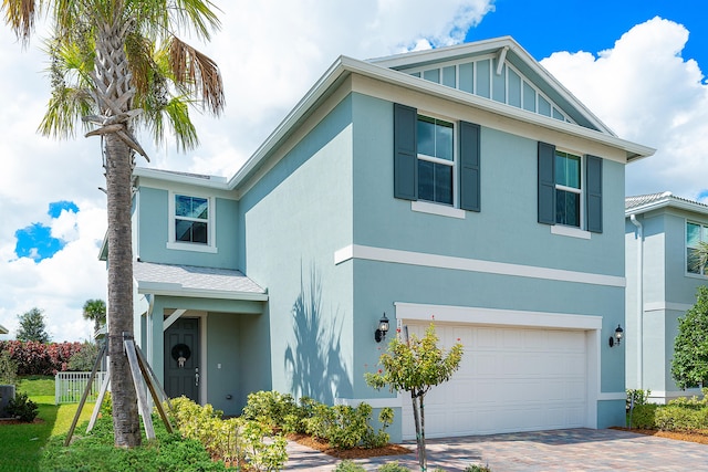 front of property with a garage