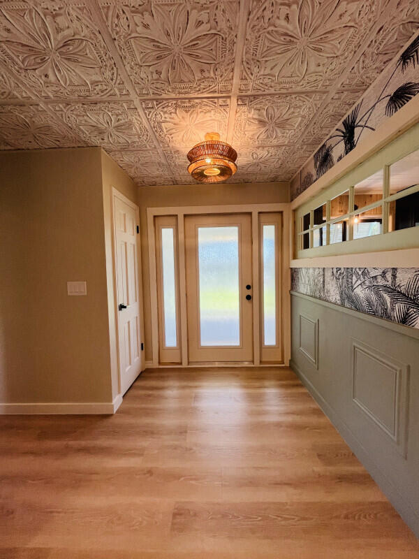 entrance foyer with light hardwood / wood-style floors