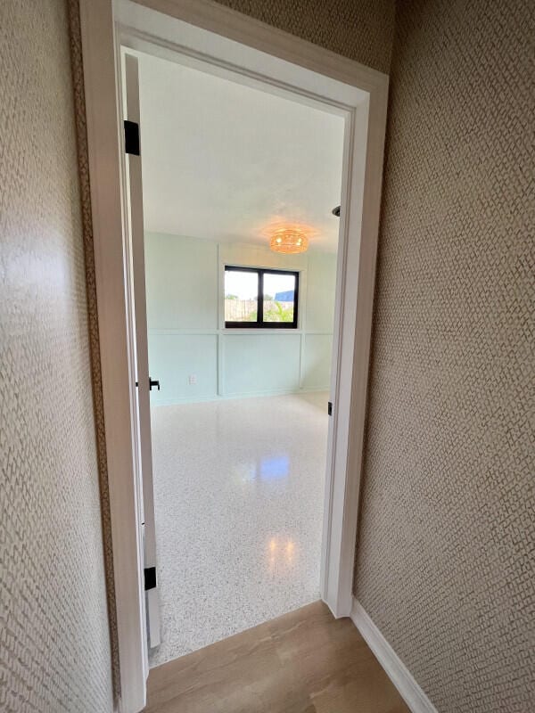 hallway featuring light hardwood / wood-style flooring