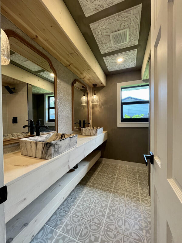 bathroom featuring vanity and tile patterned floors